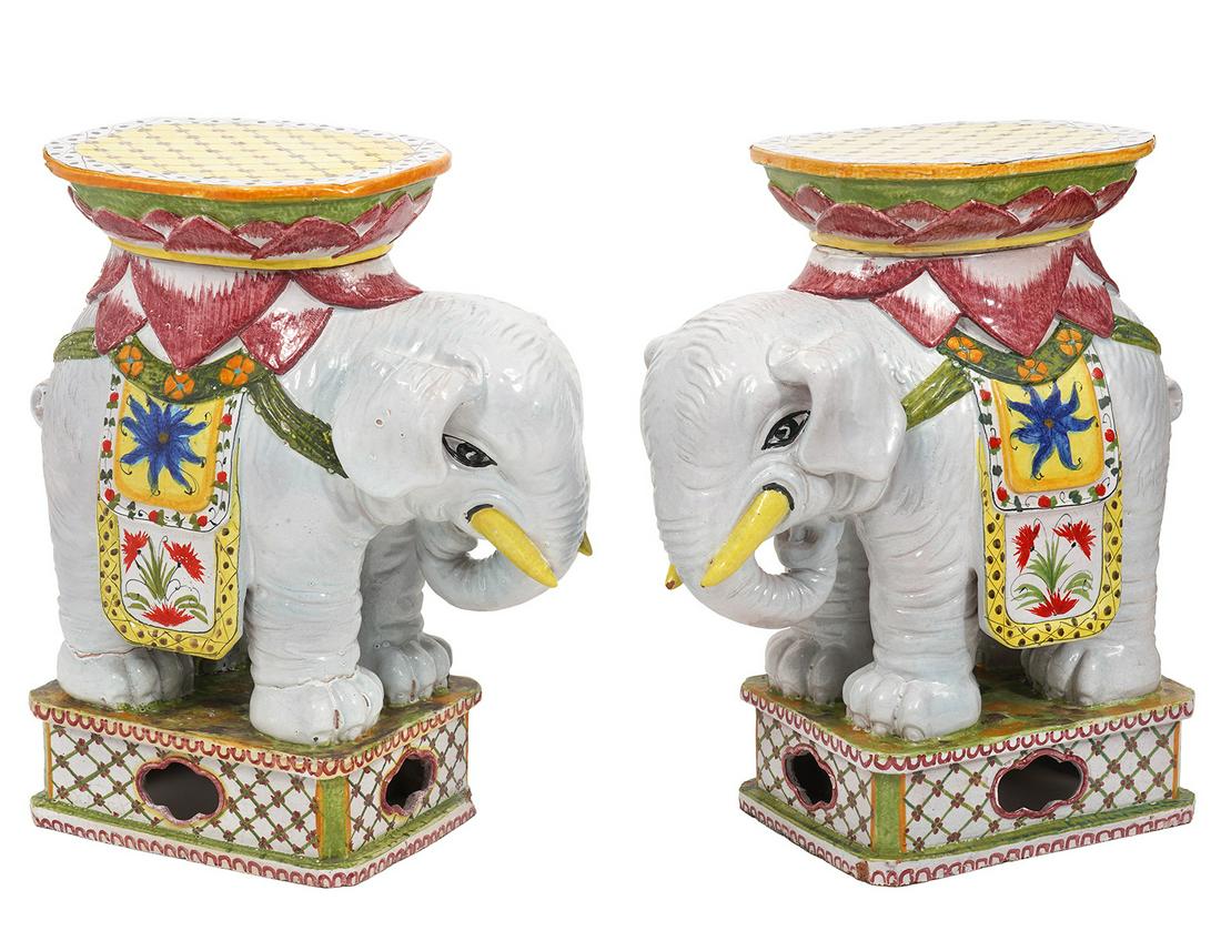 Two Italian Ceramic Elephant Garden Seats: Two Italian ceramic elephant garden seats with relaxed trunks and square tops. Measures 21.25"H x 10"W x 18"L. Condition report: some restoration to square tops, one is loose, minor small chips, pleas