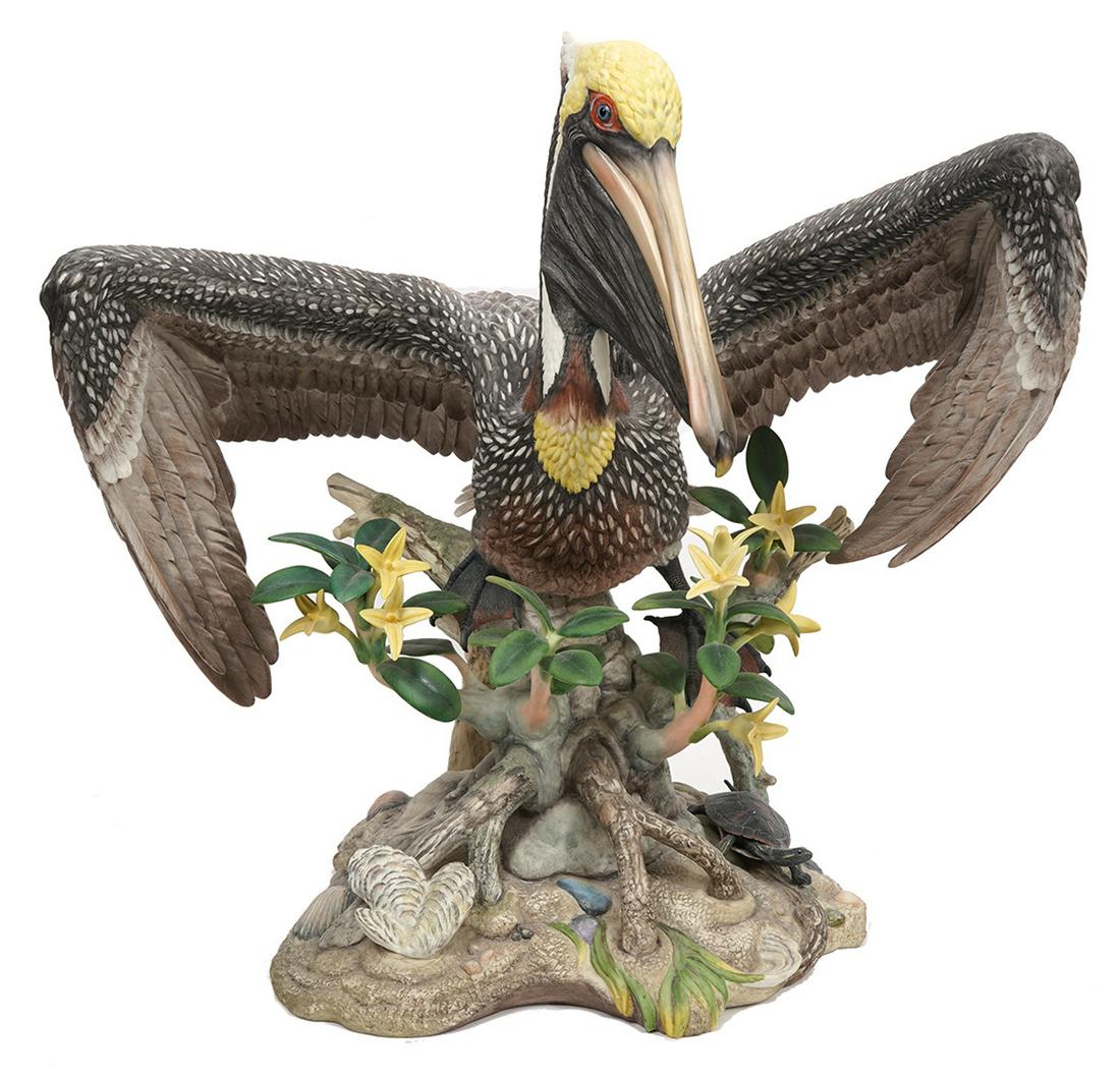 Boehm Brown Porcelain 'Pelican with Mangrove': Boehm Brown 'Pelican with Mangrove' porcelain figurine, exquisitely hand crafted and hand painted. Limited edition (#10) and hallmarked 40342. Measures 21.5"H x 16.25"D x 21.75"W. Condition report: go