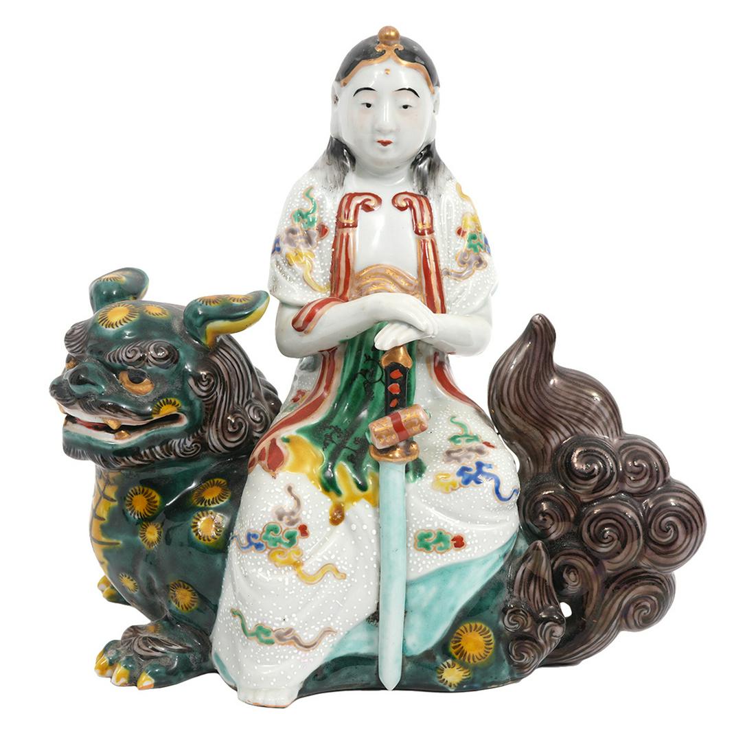 Chinese Porcelain Figure Seated on Foo Dog (1 of 10)