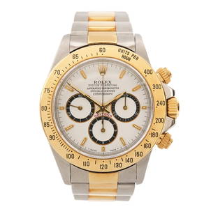 Rolex 1997 18K YG & Steel Daytona Cosmograph: 1997 Rolex 18K yellow gold and steel gentleman's Rolex Daytona Cosmograph reference 16523 chronograph wristwatch has the original white dial with gold accents and the Rolex modified Zenith 'El Primo'