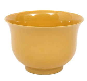 Chinese Yellow Glazed Porcelain Bowl: Chinese yellow glazed porcelain footed bowl with flared rim and circular straight foot. 2 rings and 6 character marks incised on bottom. Measures 4"H x 6"W. Condition report: good condition, no issues