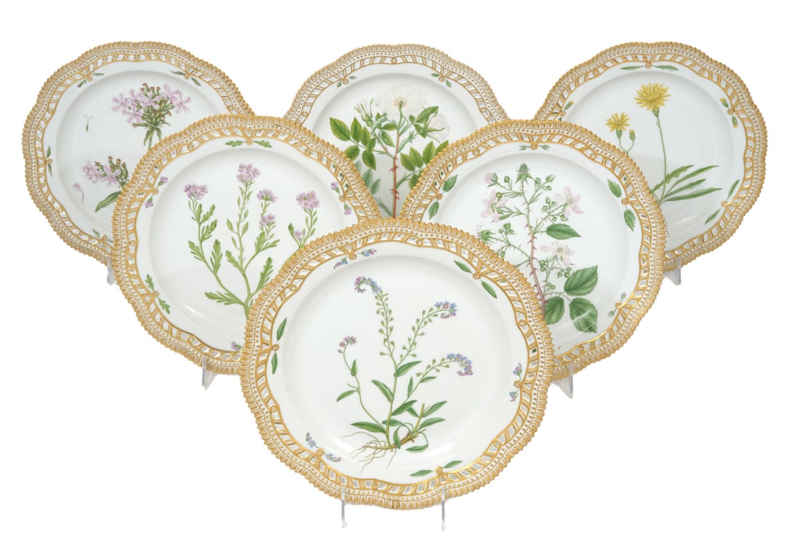 6 Royal Copenhagen Flora Danica Dinner Plates: 6 Royal Copenhagen Flora Danica dinner plates with reticulated serrated edges and gilt lace borders. Decorations are hand painted with overglaze colors and the Latin name of the plants are on the back
