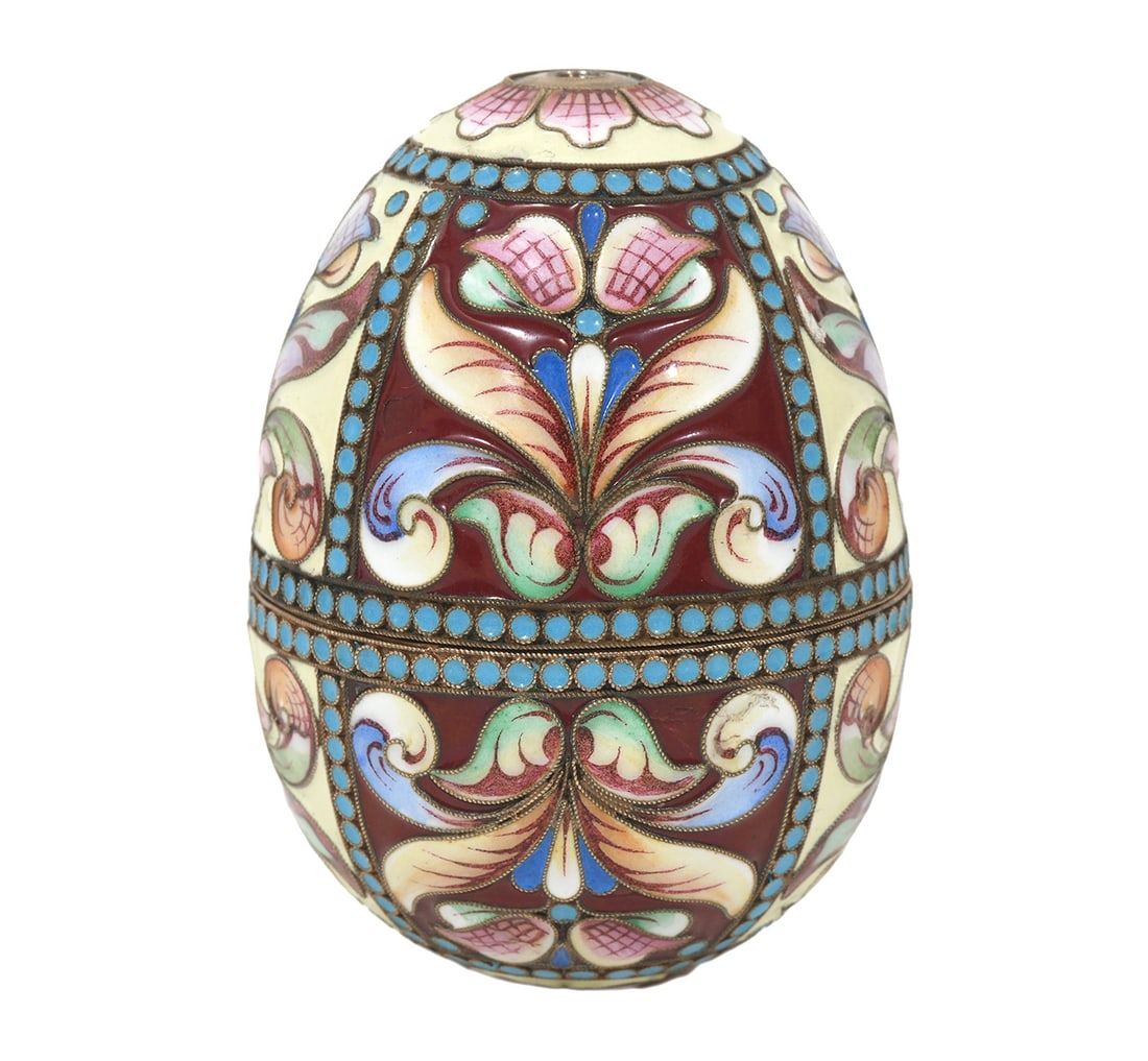Russian Cloisonne Egg Cups Maria Semyonova: Maria Semyonova, Russian (active 1896-1908). Gilded silver and cloisonne enameled egg, two halves comprising an ovoid form. Enameled with panels of stylized foliage on gilt stippled ground with turquo