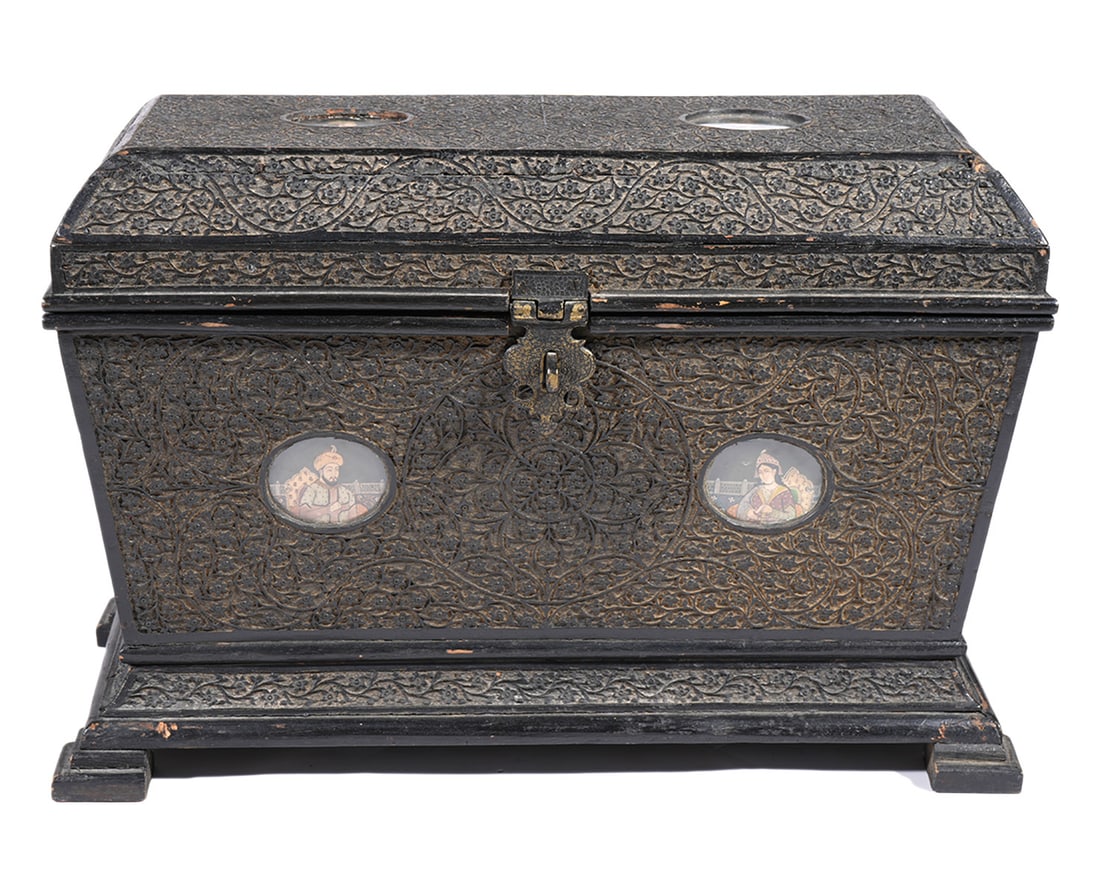 19th C. Indian Mughal Style Marriage Chest: 19th C. Indian Mughal style marriage chest with a domed lid and overall carved surface raised on 4 feet. There are 6 oval portraits on the outside measuring 3.25"W x 2.75"H each. There are 2 on the fr