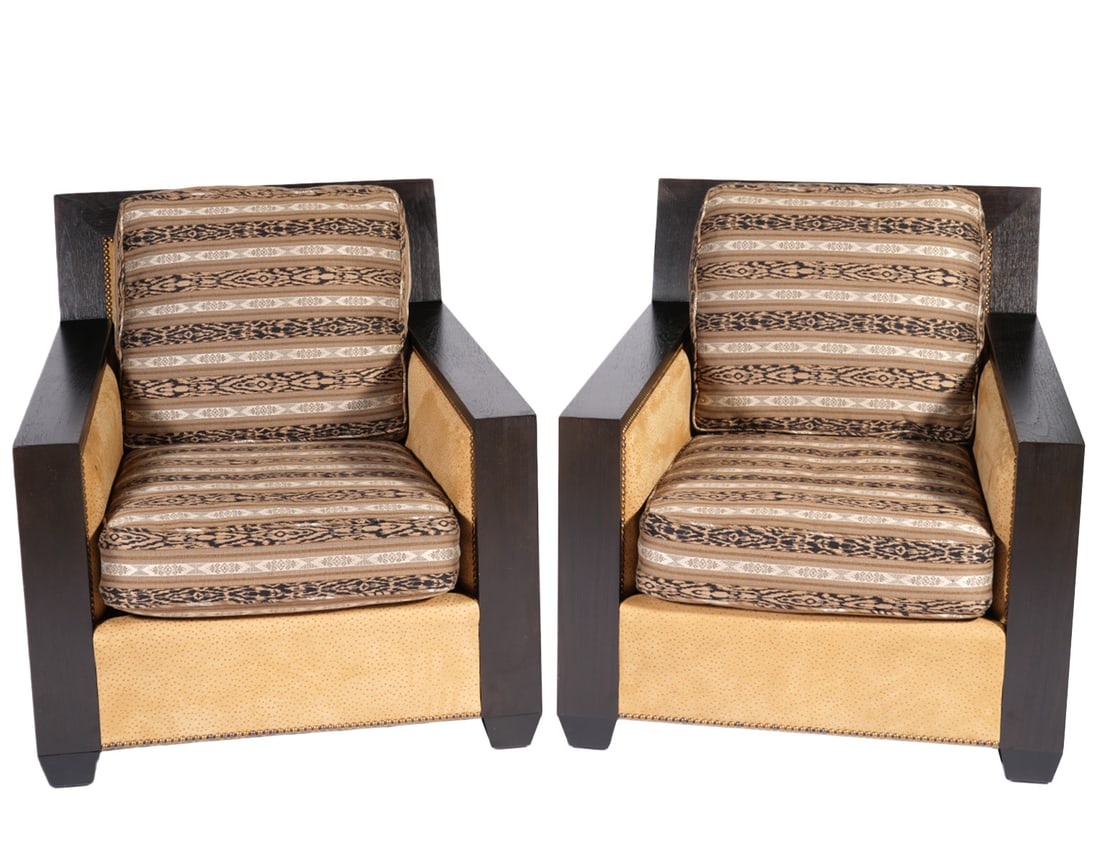 Pr. John Hutton Sutherland Lounge Chairs: Pair of early 20th Century John Hutton Sutherland Lounge Chairs with leather label under seat cushion, wood frames and cushions on seat and back. Measures 32.5"H x 29.25"W back; 32" arm to arm; 17"H x