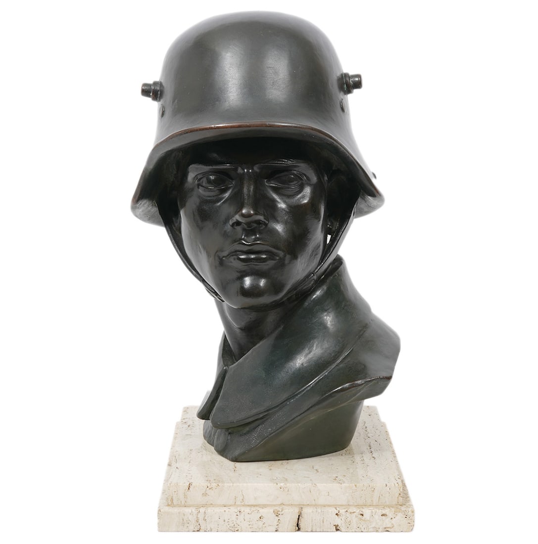 Bronze Bust of a Soldier on Marble Base: Bronze bust of a soldier in uniform on a marble base. Signed on side. 17.5" H with base x 9" W x 10.5" D. Condition report: Good overall condition with some minor chips to base. Contact AAG for more d