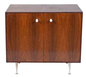 George Nelson for Herman Miller Credenza: George Nelson for Herman Miller Brazilian rosewood 'thin edge' two door credenza has a single interior shelf, is supported by 4 aluminum legs and the two doors on front have the original white porcela
