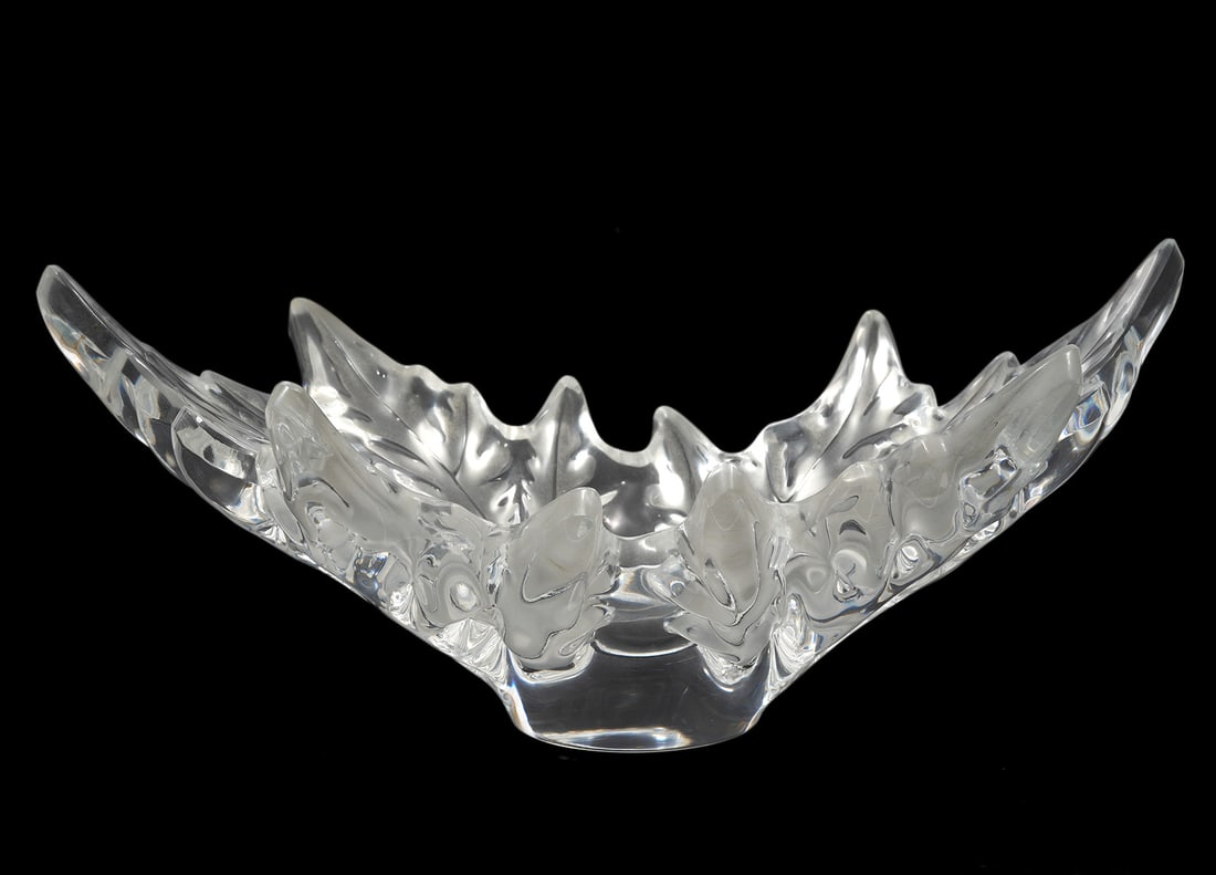 Lalique Crystal 'Champs-Elysees' Bowl: Lalique Crystal 'Champs-Elysees' Bowl was originally designed by Marc Lalique in 1951. This bowl is clear and frosted crystal and is etched on base 'Lalique France'. Measures 18"L x 9.75"W x 7.5"H. Co