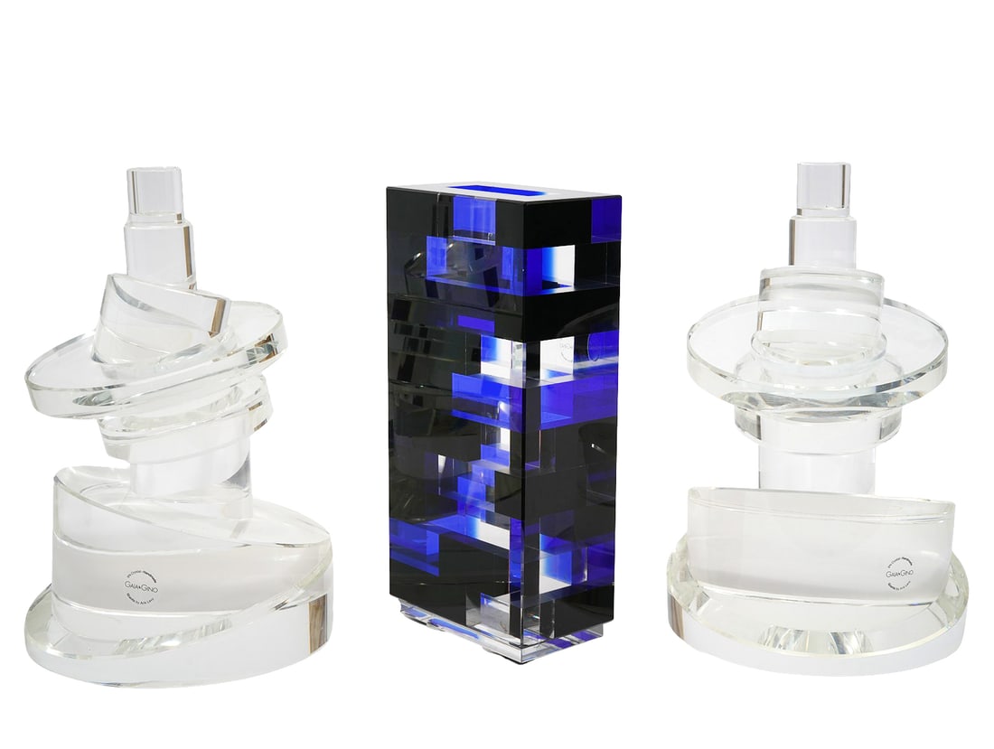 Three Arik Levy and Gaia & Gino Crystal Pieces: Arik Levy, Israel (Born 1963). Pair of sculptural quartz crystal candleholders with circular design, signed on the bottom 'Gaia & Gino Arik Levy'. Measures 11.25"H x 7"W. Condition: good condition. Co