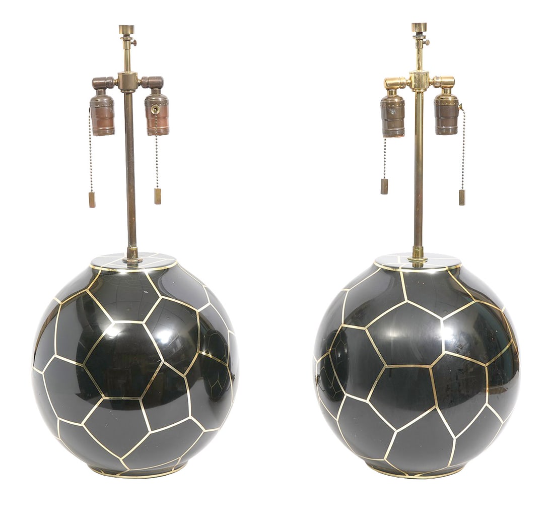 Pr. Karl Springer Geodesic Table Lamps: Pair of Karl Springer Geodesic Table Lamps with double sockets in black enamel and brass. Measures 10.5"W x 12.25"H (body) x 16.75"H (to finial). Condition: some small cracks to enamel, please see all