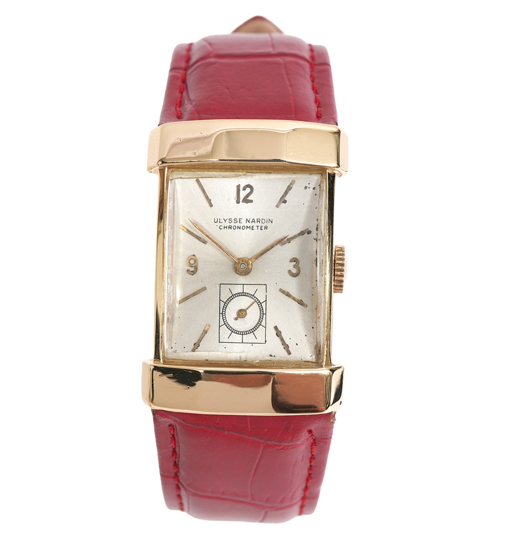 Ulysee Nardin Art Deco 'Top Hat' 14K Wristwatch: Ulysee Nardin “Top Hat” style Art Deco 14k yellow gold rectangular wristwatch with hooded lugs has a silvered metal dial with applied Arabic numerals and baton markers with subsidiary seconds.
