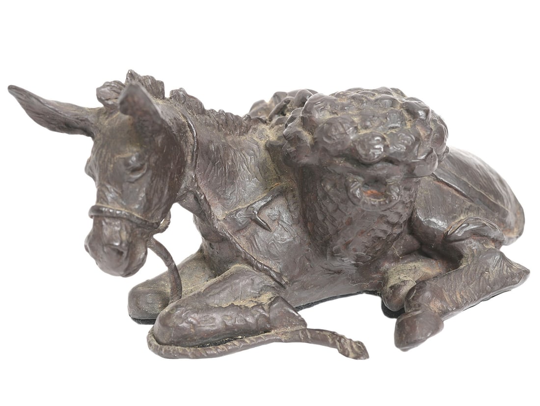 Gerald Harvey Jones 'Siesta Burro' Bronze: Gerald Harvey Jones, American (1933-2017). Patinated cast bronze western sculpture of a resting donkey with double panniers. Dated 1996, numbered 38/100, and signed. Measures 5.25"L x 2 7/8"H x 4"W. c