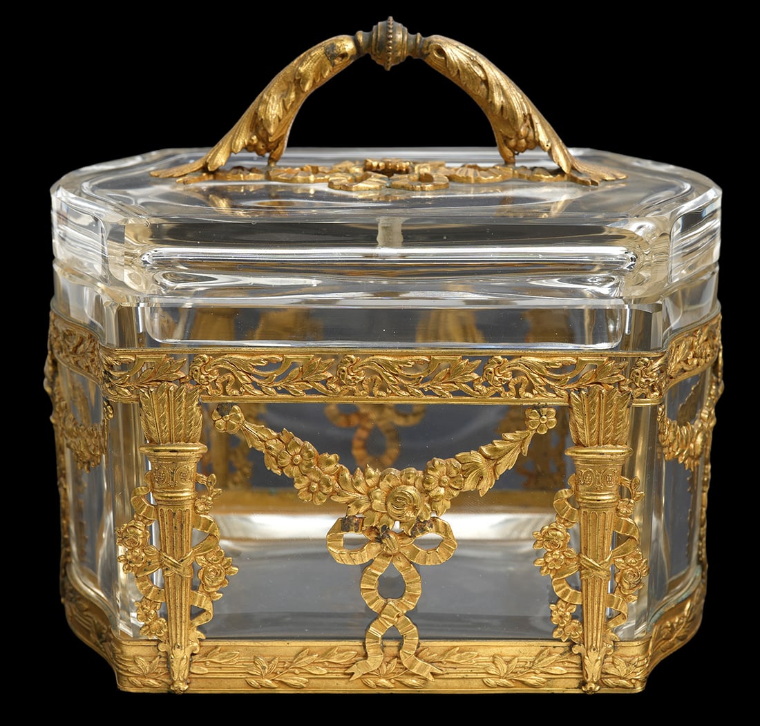 Baccarat Style Antique Cut Crystal Box: Baccarat style antique cut crystal hexagon shaped box with neoclassical ormolu mounts and handle featuring ribbons, bows and floral swag motifs. Measures 6.25"L x 4.25"W x 4.5"H; 5.25"H with handle. C