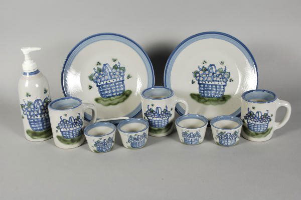 10 Pieces MA Hadley Pottery Longaberger Baskets: Group of Handpainted Longaberger Style Pottery, includes 2 plates, 3 mugs, 4 mini bowls and a lotion dispenser. Bottom is signed by M.A.Hadley.