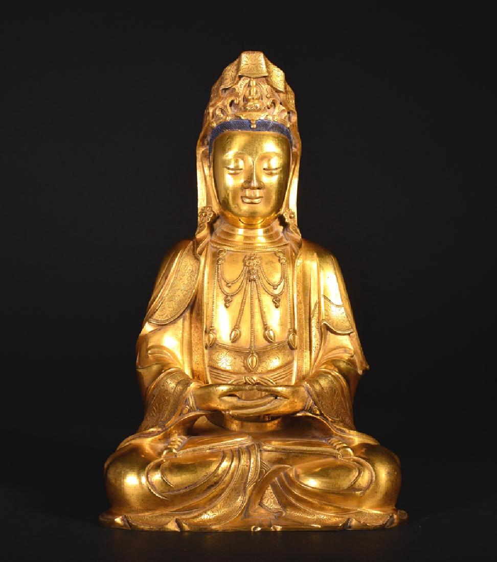 A LARGE GILT-BRONZE FIGURE OF GUANYIN, MING DYNASTY (1 of 7)