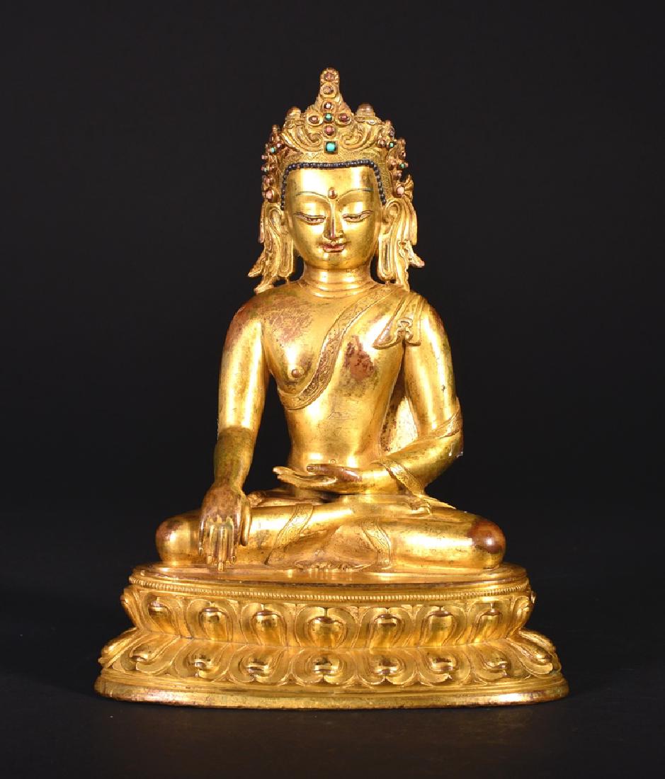 A GILT-BRONZE FIGURE OF BUDDHA, MING DYNASTY (1 of 7)