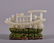 A CARVED WHITE JADE BOAT.