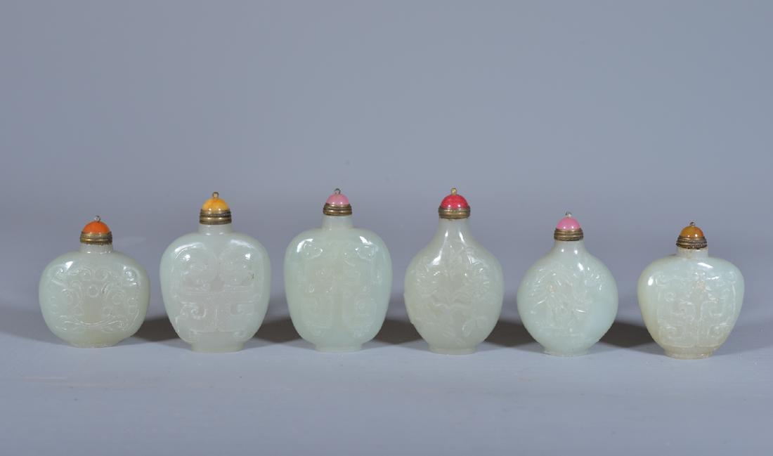 A SET OF SIX JADE SNUFF BOTTLES (1 of 6)
