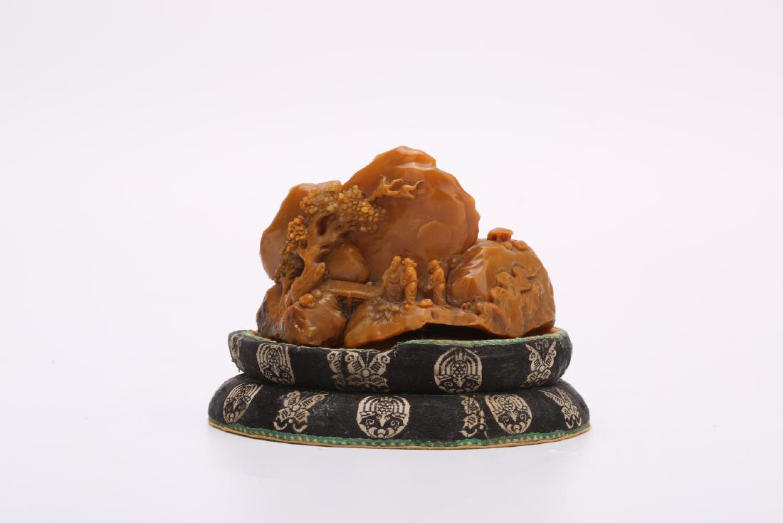 A SMALL CARVED TIANHUANG 'FIGURE AND LANDSCAPE' (1 of 6)