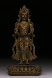 A GILT-BRONZE FIGURE OF GUANYIN.MING PERIOD