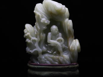 A CARVED WHITE JADE 'LUOHAN' BOULDER.QING PERIOD