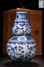 A BLUE AND WHITE DOUBLE-GOURD VASE.MARK OF GUANGXU