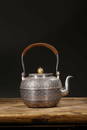 A JAPANESE GILT-SILVER TEAPOT AND COVER.ANTIQUE