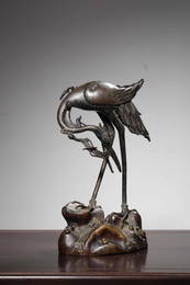 A CARVED BRONZE CRANE .QING PERIOD