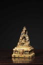 A GILT-BRONZE FIGURE OF GURU.QING PERIOD