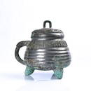 A BRONZE TRIPOD VESSEL.SHANG PERIOD