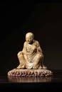 A CARVED SOAPSTONE LUOHAN.QING PERIOD