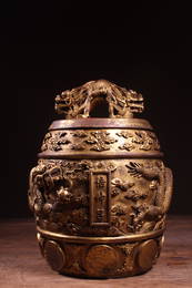 A CARVED GILT-BRONZE 'DRAGON' BELL. QIANLONG PERIOD