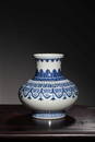 A BLUE AND WHITE BOTTLE VASE.MARK OF QIANLONG