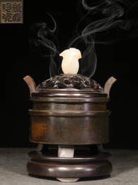 A BRONZE BURNER AND COVER.QING PERIOD
