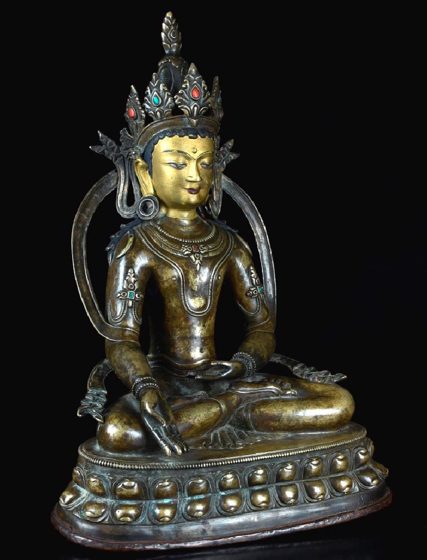 A GILT-BRONZE FIGURE OF BUDDHA (1 of 6)