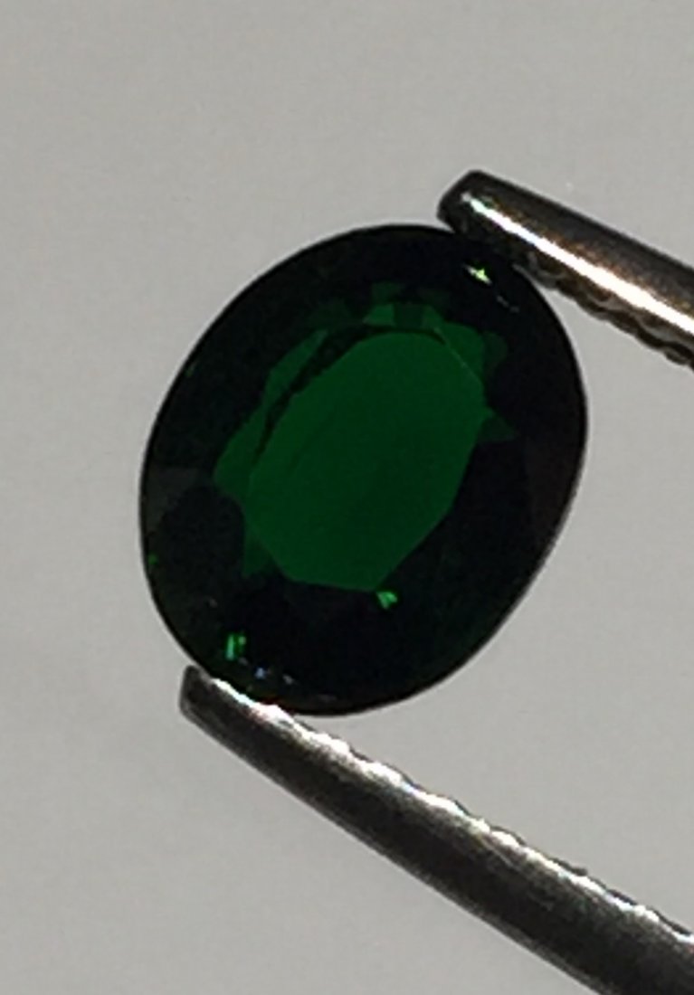 Tsavorite (Green Garnet) Oval Cut 1.13 cts: Tsavorite (Green Garnet) Oval Cut 1.13 cts, Beautiful intense Green Color with good Luster, measurements 6.9*5.5*3.6 mm, all photos are originals , what you see you will get same,