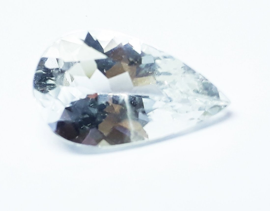 Natural White Beryl - 2.80 ct.: Natural White Beryl - 2.80 ct. , Color - White , Shape - Pear Cut , Dimension - 14.8 x 8.8 x 5.7 (mm) , Facet Cut Design with Smooth Surface, Good Quality With luster.