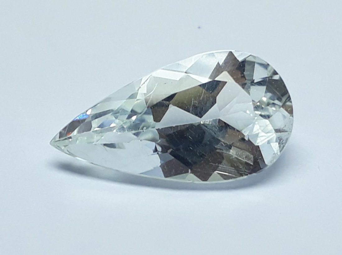 Natural White Beryl - 3.39 ct.: Natural White Beryl - 3.39 ct. , Color - White , Shape - Pear Cut , Dimension - 14.6 x 7.9 x 5.3 (mm) , Facet Cut Design with Smooth Surface, Good Quality With luster.