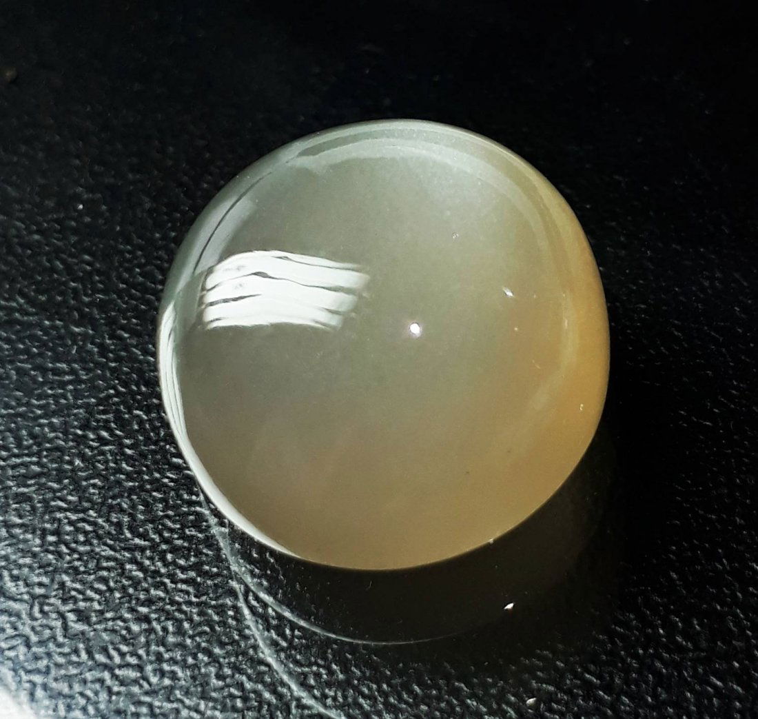 Natural Cabochon Moonstone - 20.07 ct.: Natural Cabochon Moonstone - 20.07 ct. , Color - Brownish White ,Shape - Round, Cabochon Cut Design with smooth surface , Origin - Africa , Good Quality With Luster.