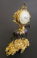 Gilt Bronze Clock Mounted On A Brown Patinat Bronze Hor - 2