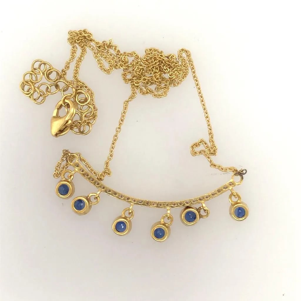 14K Yellow Gold Diamond & Tsavorite Necklace: Dimonds weighs: .25 Cts. Tsavorite weighs: .90 Cts. Necklace weighs: 4.2 grams. Necklace is adjustable. 16 - 18".Length: 1 1/4". Condition: Excellent. New. Stamped: 14K Gold