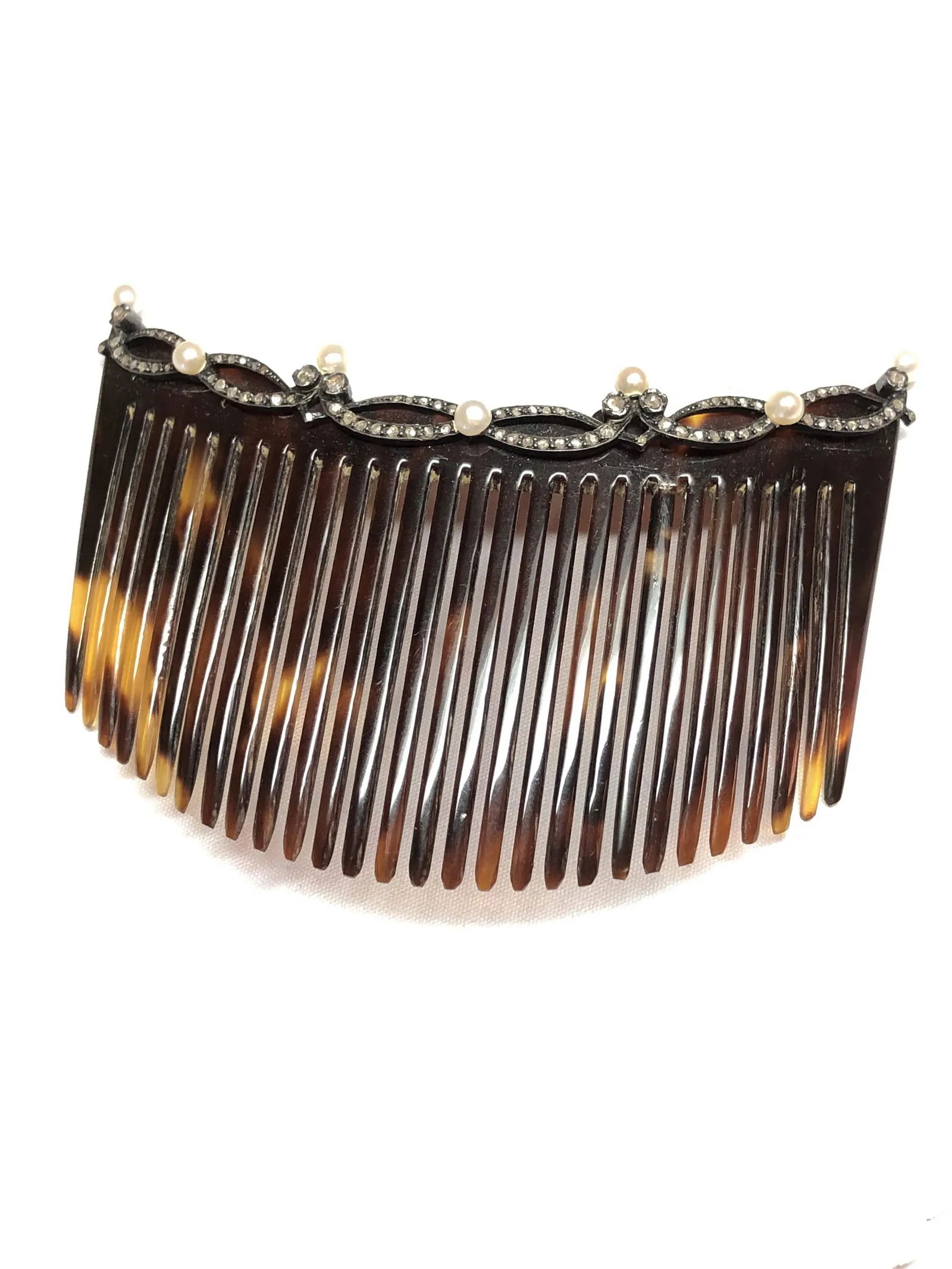 Victorian, tortoise shell+ pearls+diamonds Hair Comb.: Circa 1850s. The lovely Comb is made of tortoiseshell, designed with seven natural Pearls ( measures 3 1/2mm each) and many rose-cut diamonds set on silver. Measurements 2" long. 3 1/2" width. Conditi