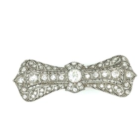 Art deco platinom and diamond bow brooch