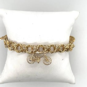 14K Yellow Gold Charm Bracelet.