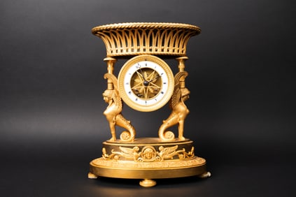 French Empire Gilt Bronze Mantel Clock Signed Angevin a Paris Circa 1800.