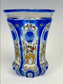 A MAGNIFICENT GILT AND ENAMELLED MOSER BEAKER