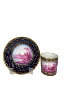 A 19th Century Continental Gilt & Hand Painted Porcelain Cup & Saucer