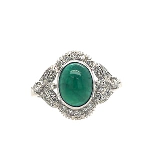 Emerald cabochon and diamond ring
