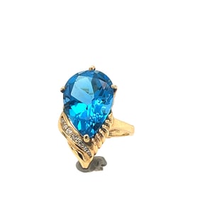Blue topaz and diamond ring