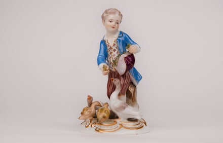 A Meissen Porcelain Sculpture Of A Lady Feeding Ducks
